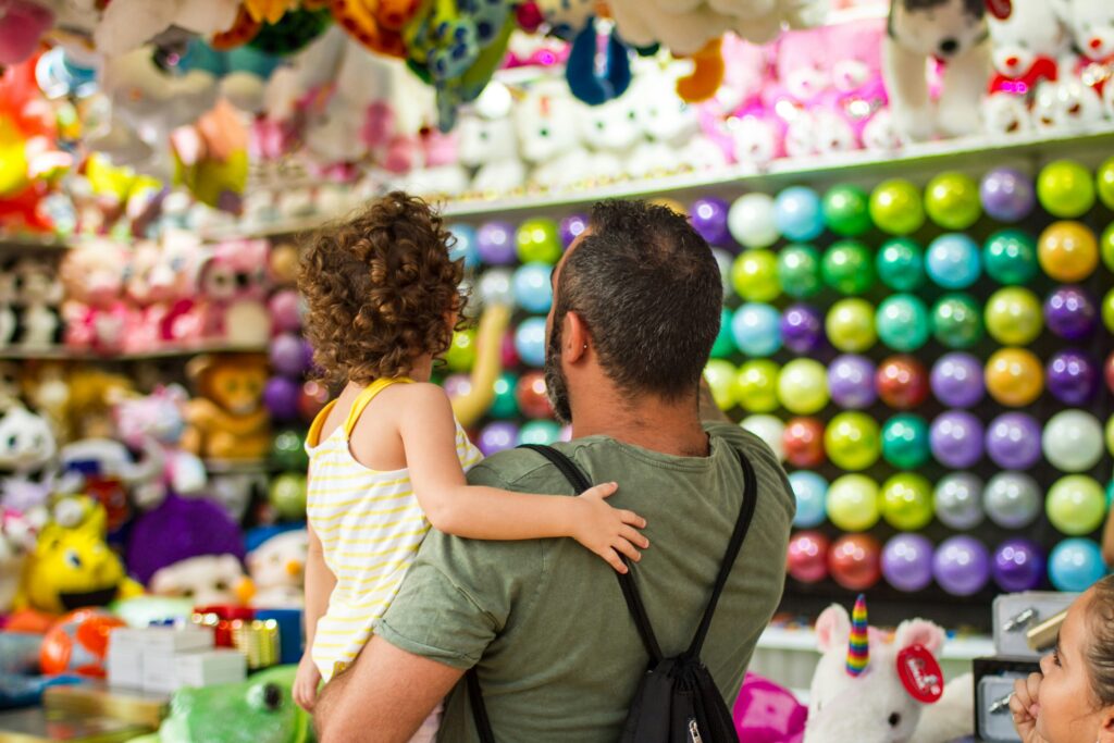 Father and daughter together in the market
